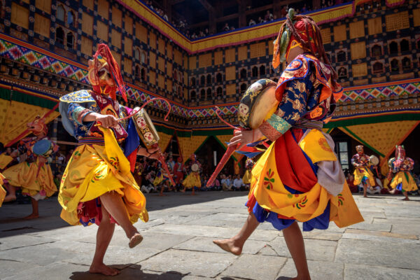 2,Monks,Dancing,For,Colorful,Mask,Dance,At,Yearly,Paro