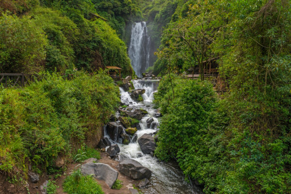 The,Waterfall,Of,Peguche,With,Its,Tropical,Vegetation,Right,Outside