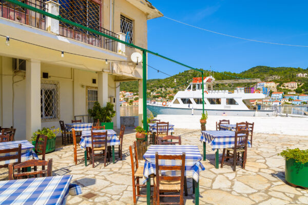 Chairs,With,Tables,In,Traditional,Greek,Restaurant,In,Vathy,Port,