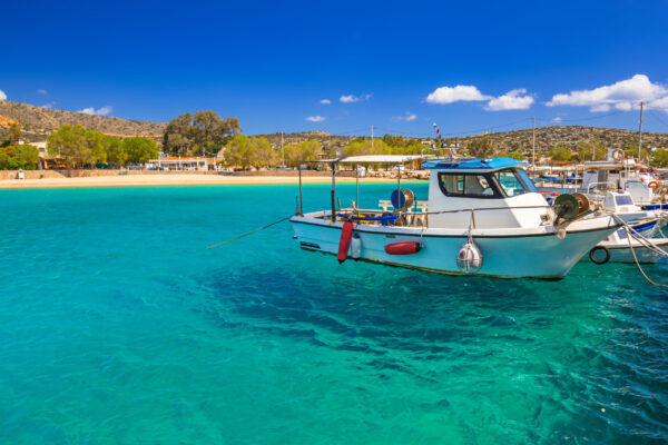 Blue,Lagoon,Of,Marathi,Bay,With,Fishing,Boats,On,Crete,