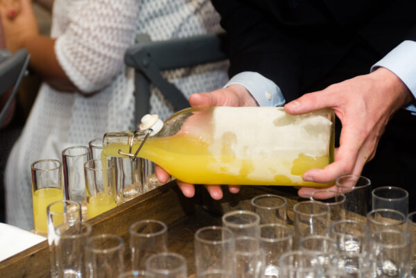 Serving,Limoncello,In,Glasses