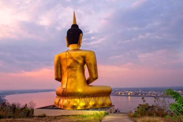 Big,Statue,Of,Golden,Buddha,On,A,Mountain,,Wat,Phou