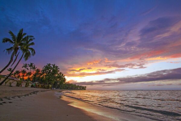 Malerische Bilderbuchszenerie beim Sonnenuntergang am Strand von Bayahibe